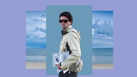 Mann mit Sonnenbrille und in Übergangsjacke von Dior.