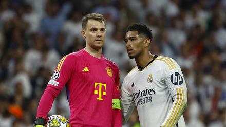 Trost vom Gegner. Jude Bellingham (rechts) und Manuel Neuer.