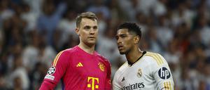Trost vom Gegner. Jude Bellingham (rechts) und Manuel Neuer.