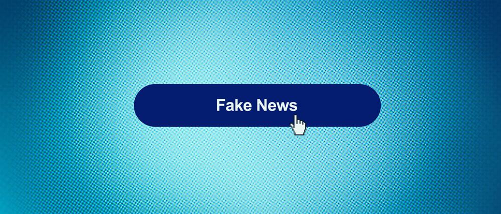 Fake News-Button auf einem Computer-Screen.