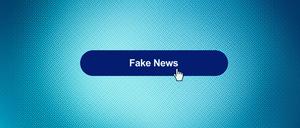 Fake News-Button auf einem Computer-Screen.
