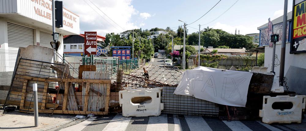 A roadblock is pictured during French President Emmanuel Macron’s visit in Noumea, France’s Pacific territory of New Caledonia on May 23, 2024. 