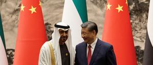 Chinese President Xi Jinping and United Arab Emirates President Sheikh Mohammed bin Zayed Al Nahyan shake hands following a signing ceremony at the Great Hall of the People in Beijing, China May 30, 2024. REUTERS/Tingshu Wang/Pool