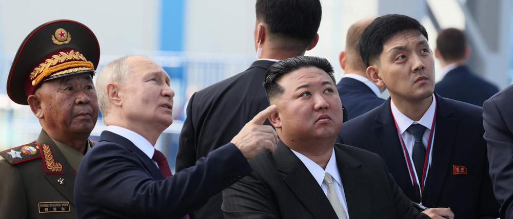 (FILES) In this pool photo distributed by Sputnik agency, Russia's President Vladimir Putin (centre L) and North Korea's leader Kim Jong Un (centre R) visit the Vostochny Cosmodrome in Amur region on September 13, 2023. North Korean leader Kim Jong Un on June 12, 2024 hailed his country's ties with Russia, saying the two nations were "invincible comrades-in-arms", amid reports President Vladimir Putin will visit Pyongyang imminently. (Photo by Mikhail Metzel / POOL / AFP)