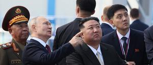 (FILES) In this pool photo distributed by Sputnik agency, Russia's President Vladimir Putin (centre L) and North Korea's leader Kim Jong Un (centre R) visit the Vostochny Cosmodrome in Amur region on September 13, 2023. North Korean leader Kim Jong Un on June 12, 2024 hailed his country's ties with Russia, saying the two nations were "invincible comrades-in-arms", amid reports President Vladimir Putin will visit Pyongyang imminently. (Photo by Mikhail Metzel / POOL / AFP)