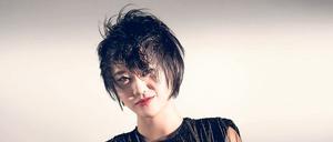 Yuja Wang. Die Bühne betritt sie gerne auf
High Heels und im hochgeschlitzten Kleid.