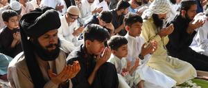 Muslim offer Eid al-Adha prayers in Quetta on June 17, 2024. 