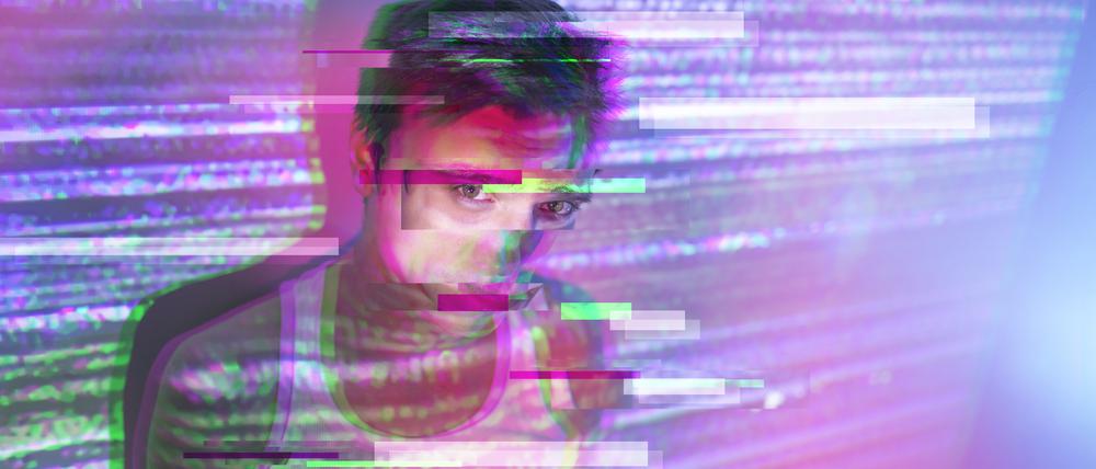 Ist es ein Mensch, oder eine Maschine? Das ist die entscheidene Frage beim Turing-Test. Auch auf dem Bild ist schwer zu erkennen, ob es sich um einen Code oder einen Menschen handelt.