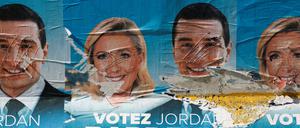 Gegner des rechtsradikalen RN haben Wahlplakate mit Marine Le Pen und Jordan Bardella beschädigt. 