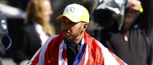 Heimsieg. Lewis Hamilton feiert. 
