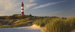 Nannings Kindheitsinsel. Der Leuchtturm von Nebel auf der nordfriesischen Insel Amrum.