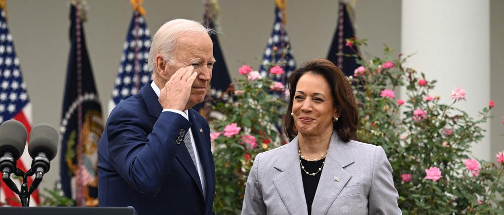 (FILES) US President Joe Biden, with Vice President Kamala Harris, salutes after announcing the White House Office of Gun Violence Prevention, in the Rose Garden of the White House in Washington, DC, September 22, 2023.