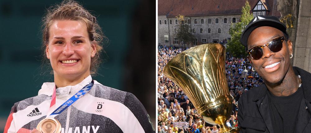 Das Fahnen-Doppel bei der Eröffnungsfeier: Anna-Maria Wagner und Dennis Schröder.