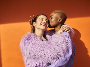 Colourful studio portrait of two women