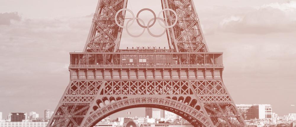 22.07.2024, Frankreich, Paris: Vor den Olympischen Sommerspielen, Olympia Paris 2024, Blick auf den Eiffelturm mit den Olympischen Ringen. Foto: Michael Kappeler/dpa +++ dpa-Bildfunk +++