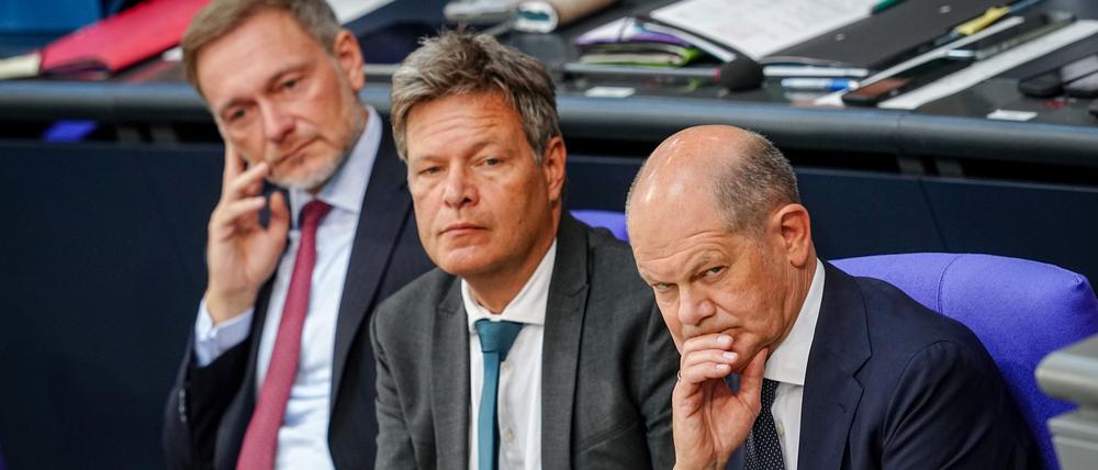 Am Ende ihrer gemeinsamen Etatpolitik: Finanzminister Christian Lindner, Wirtschaftsminister Robert Habeck und Bundeskanzler Olaf Scholz (von links).