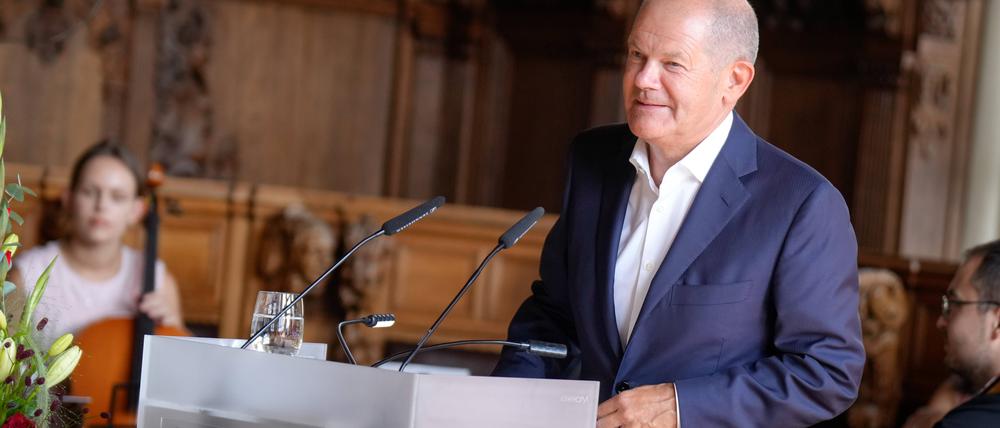Einbuergerungsfeier in Bremen mit Bundeskanzler Scholz.
