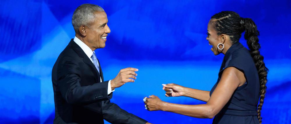 Der frühere US-Präsident Barack Obama (links) und seine Frau Michelle beim Parteitag der US-Demokraten.