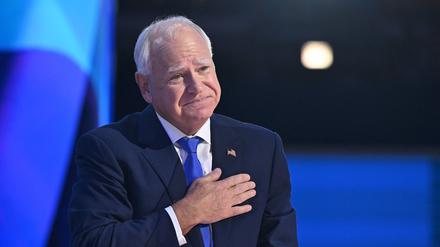TOPSHOT - Minnesota Governor and 2024 Democratic vice presidential candidate Tim Walz gestures after speaking on the third day of the Democratic National Convention (DNC) at the United Center in Chicago, Illinois, on August 21, 2024. Vice President Kamala Harris will formally accept the party’s nomination for president at the DNC which runs from August 19-22 in Chicago. (Photo by SAUL LOEB / AFP)