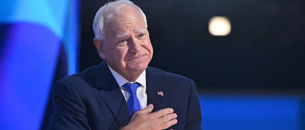 TOPSHOT - Minnesota Governor and 2024 Democratic vice presidential candidate Tim Walz gestures after speaking on the third day of the Democratic National Convention (DNC) at the United Center in Chicago, Illinois, on August 21, 2024. Vice President Kamala Harris will formally accept the party’s nomination for president at the DNC which runs from August 19-22 in Chicago. (Photo by SAUL LOEB / AFP)