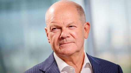 Bundeskanzler Olaf Scholz (SPD) vertraut der deutschen Autobranche.