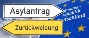 Symbolbild Asyldebatte: Richtungspfeile zeigen in die Richtung ASYLANTRAG und ZURÜCKWEISUNG, daneben ein Grenzschild der Bundesrepublik Deutschland Copyright: xUdoxHerrmannx