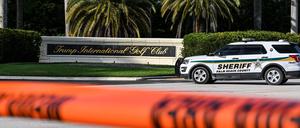 TOPSHOT - A Sherrif block the street outside the Trump International Golf Club in West Palm Beach, Florida, on September 15, 2024 following a shooting incident at former US president Donald Trump's golf course. Trump's campaign reported Sunday that there had been "gunshots in his vicinity" but added that the Republican presidential candidate was safe. (Photo by CHANDAN KHANNA / AFP)