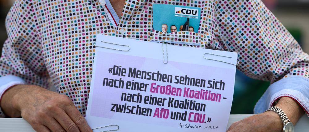 Eine Koalition zwischen AfD und CDU: am Rande einer Wahlkampfveranstaltung in Brandenburg/Havel plädiert ein CDU-Anhänger für diese Option.