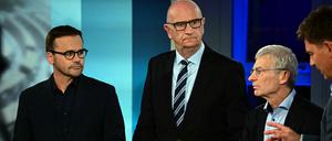 Jan Redmann von der CDU (links), SPD-Ministerpräsident Dietmar Woidke (Mitte) und AfD-Spitzenkandidat Hans-Christoph Berndt (rechts) stellen sich den Fragen von RBB-Moderator Sascha Hingst. 