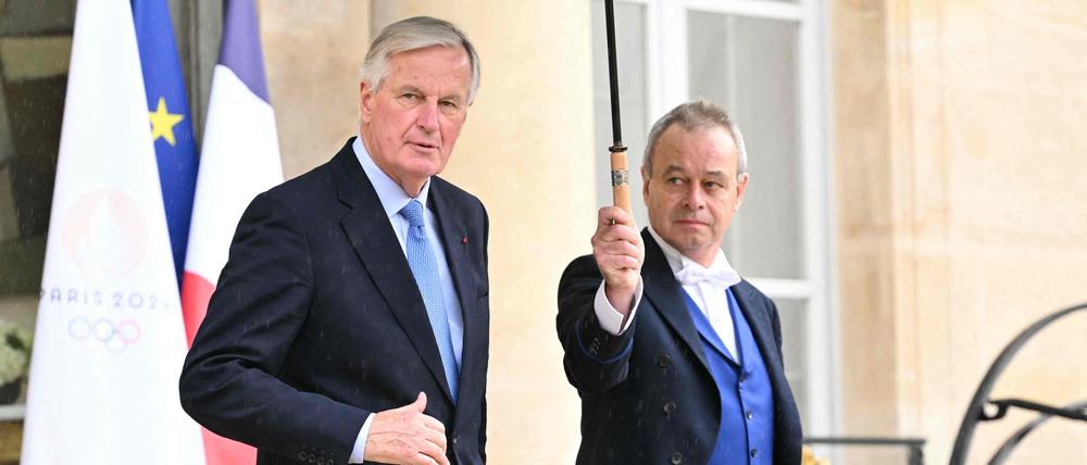 Premierminister Michel Barnier (l.) nach dem ersten Kabinettstreffen am Montag.