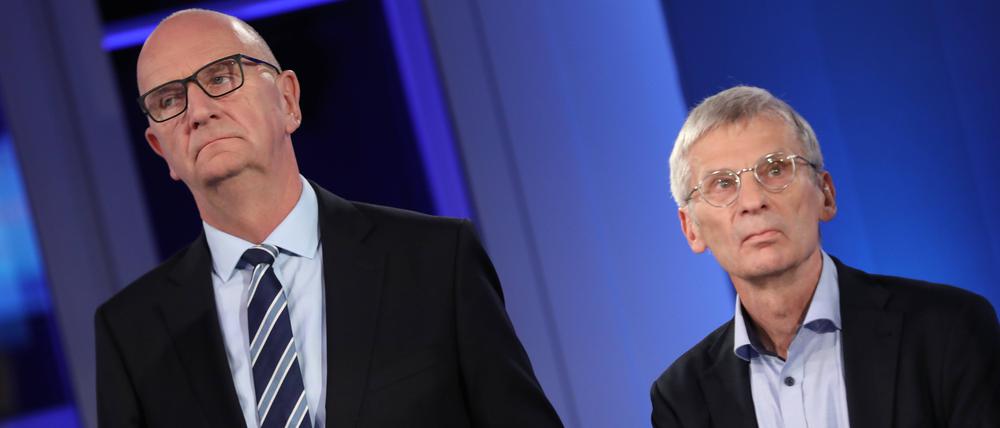 Gefühlte Brandmauer: Ministerpräsident Dietmar Woidke (l.) und AfD-Spitzenkandidat Hans-Christoph Berndt (r.) am Wahlabend in einem Fernsehstudio.
