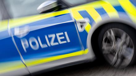 Symbolfoto mit einem Polizeiauto.