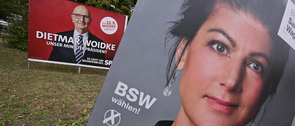 Plakate von Sahra Wagenknecht und Dietmar Woidke.