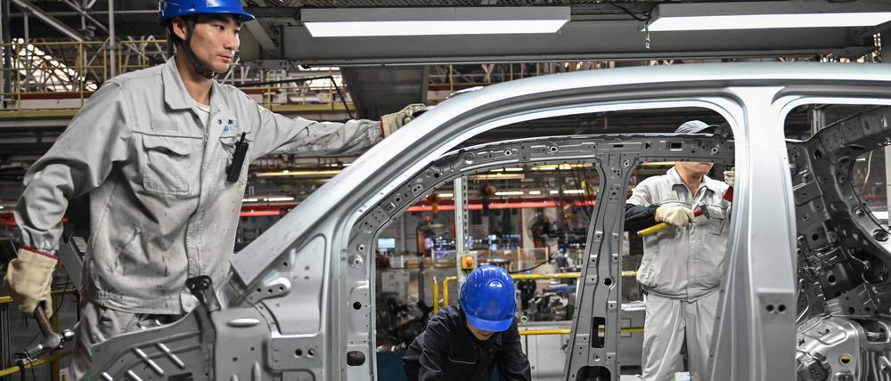 Montage von E-Autos in einer Fabrik in Jinhua in Chinas östlicher Provinz Zhejiang.