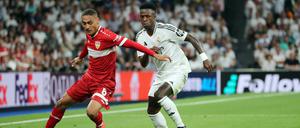 Auch gegen Vinicius Junior(r.) von Real Madrid behauptete sich Enzo Millot.