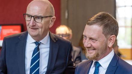 Wegen Appell zum Ukraine-Krieg in der Kritik: Dietmar Woidke und Michael Kretschmer. (Archivbild)