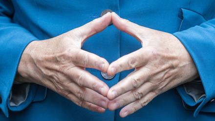 Symbol der Macht: Angela Merkels ruhige Hand.