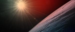 Die Sonne scheint über dem Horizont der Erde, während die Internationale Raumstation über der kanadischen Provinz Quebec kreist. 