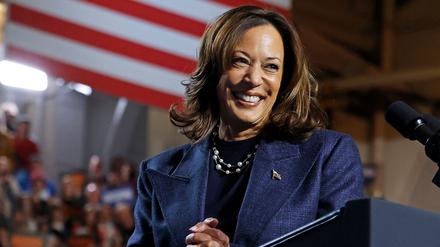TOPSHOT - US Vice President and Democratic presidential nominee Kamala Harris smiles during a campaign rally at Michigan State University's Jenison Field House in East Lansing, Michigan, on November 3, 2024. (Photo by JEFF KOWALSKY / AFP)