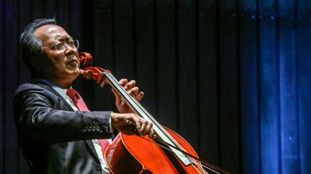 (FILES) In this file photo French-born Chinese-American cellist Yo-Yo Ma plays during a concert at the Metropolitan Theater in Medellin, Antioquia department, Colombia on May 9, 2019. - Receiving a second Covid vaccine dose is often a cause for celebration and, in one US clinic, legendary cellist Yo-Yo Ma marked the occasion with a surprise recital. Ma was pictured playing the cello while wearing a mask and sitting on a plastic chair at the Berkshire Community College in Massachusetts during his 15-minute observation period after getting the jab on March 13, 2021. (Photo by JOAQUIN SARMIENTO / AFP)
