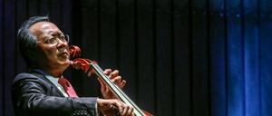 (FILES) In this file photo French-born Chinese-American cellist Yo-Yo Ma plays during a concert at the Metropolitan Theater in Medellin, Antioquia department, Colombia on May 9, 2019. - Receiving a second Covid vaccine dose is often a cause for celebration and, in one US clinic, legendary cellist Yo-Yo Ma marked the occasion with a surprise recital. Ma was pictured playing the cello while wearing a mask and sitting on a plastic chair at the Berkshire Community College in Massachusetts during his 15-minute observation period after getting the jab on March 13, 2021. (Photo by JOAQUIN SARMIENTO / AFP)