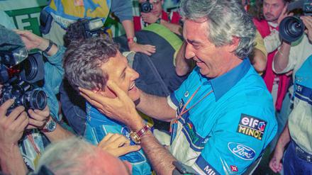 Michael Schumacher (l) und Flavio Briatore (r) - sie hatten es allen gezeigt und die etablierten Hersteller geschlagen. 