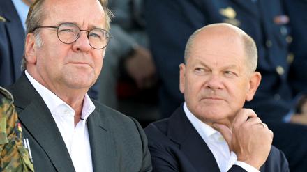 FILE PHOTO: German Chancellor Olaf Scholz and Defence Minister Boris Pistorius take part in the commissioning of the IRIS-T SLM air defence system at the German army Bundeswehr barracks Todendorf in Panker, Germany September 4, 2024. REUTERS/Fabian Bimmer/File Photo