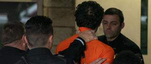 Luigi M., Verdächtigter im Zusammenhang mit den tödlichen Schüssen auf den CEO von UnitedHealthcare, Brian Thompson, wird am Dienstag, 10. Dezember in das Gerichtsgebäude von Blair County gebracht.