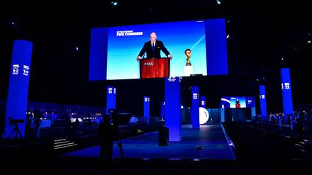 A speech by President of FIFA Gianni Infantino is broadcasted on a screen during a ceremony in the capital Riyadh on December 11, 2024, as the FIFA Congress votes for the hosting rights for the 2034 World Cup with Saudi Arabia being the sole candidate. (Photo by AFP)