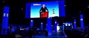 A speech by President of FIFA Gianni Infantino is broadcasted on a screen during a ceremony in the capital Riyadh on December 11, 2024, as the FIFA Congress votes for the hosting rights for the 2034 World Cup with Saudi Arabia being the sole candidate. (Photo by AFP)