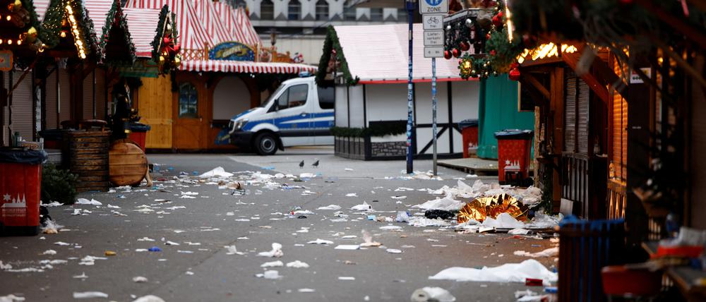 A police vehicle stands at the site where a car drove into a crowd at a Magdeburg Christmas market in Magdeburg, Germany December 21, 2024. REUTERS/Axel Schmidt