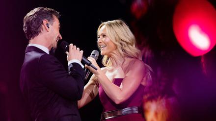 Singen zusammen ein Duett: Die Schlagerstars Helene Fischer (r.) und Florian Silbereisen. (Archivbild)
