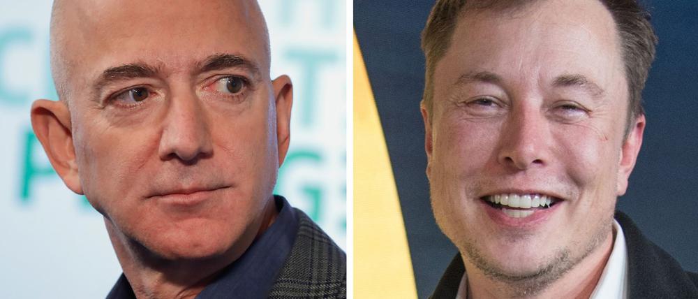 Elon Musk (rechts) und Jeff Bezos haben beide Weltraumunternehmen gegründet. (Archivbild)
