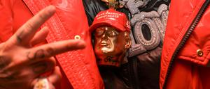 Detail shot of a guest wearing an accessory depicting U.S. President-elect Donald Trump at the Power 30 Awards, an inauguration party sponsored by TikTok for influencers who supported him, in Washington, D.C., U.S., January 19, 2025.  REUTERS/Kevin Mohatt